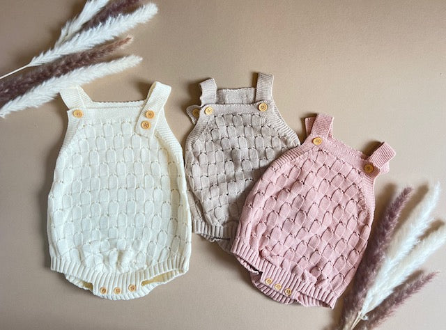 Knitted romper with buttons