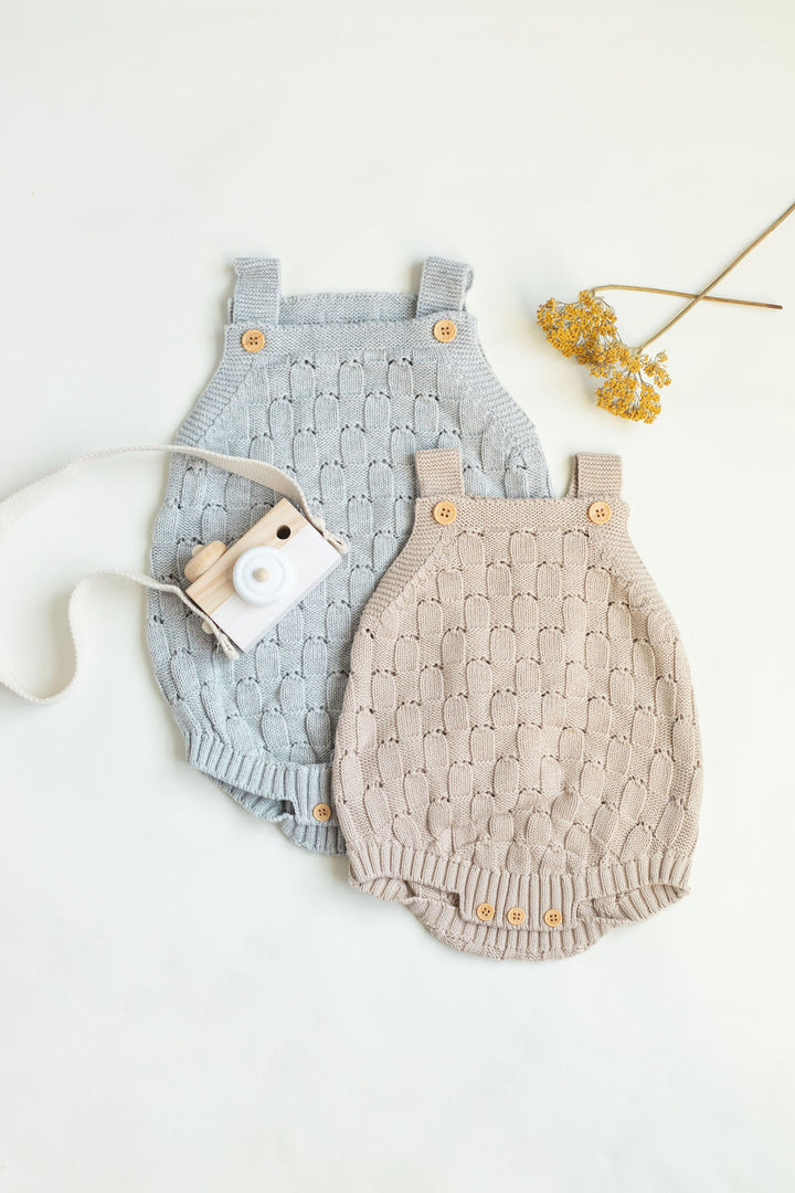 Knitted romper with buttons